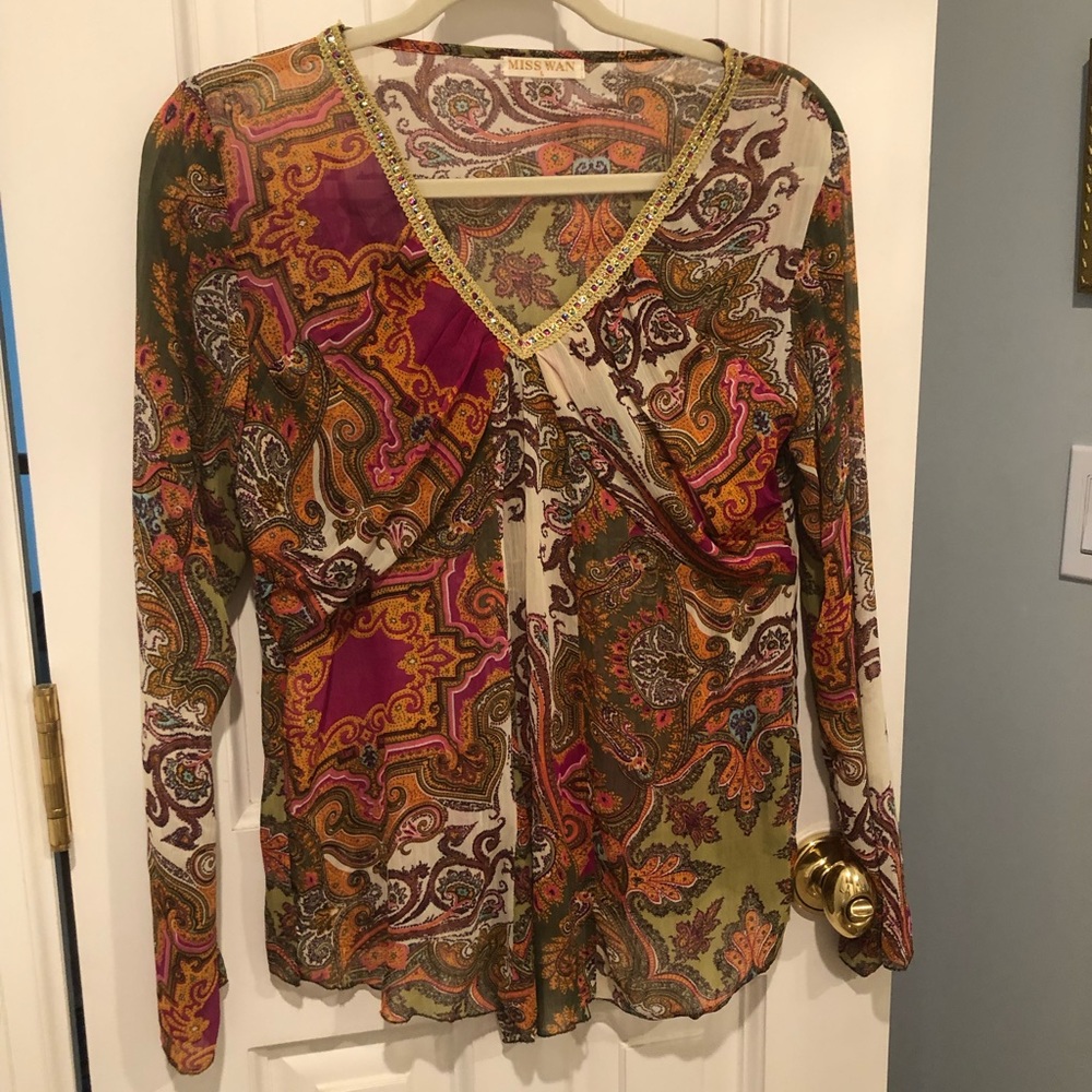 Flowing paisley top.